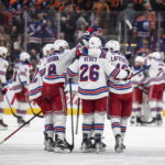 
              New York Rangers celebrate a shootout win over the Edmonton Oilers during an NHL hockey game Friday, Feb. 17, 2023, in Edmonton, Alberta. (Jason Franson/The Canadian Press via AP)
            