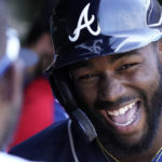 
              FILE -  Atlanta Braves' Michael Harris II., right, smiles as he celebrates with teammates after hitting a solo home run during the fifth inning of a baseball game against the Chicago Cubs in Chicago, on June 19, 2022. Harris II — whose call up last year propelled the Braves to 101 wins and a division title — said Saturday he “had an all right season, I guess” and then responded with more modesty when asked if that's really how he feels about 2022. (AP Photo/Nam Y. Huh, File)
            