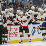 
              Ottawa Senators players celebrate a goal against the New York Islanders during the second period of an NHL hockey game Tuesday, Feb. 14, 2023, in Elmont, N.Y. (AP Photo/Eduardo Munoz Alvarez)
            
