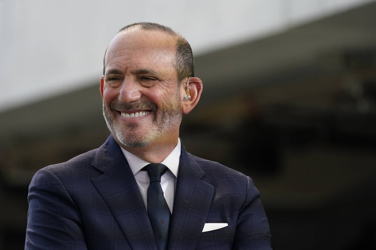 FILE - MLS Commissioner Don Garber conducts an interview before the MLS Cup soccer match between LA...