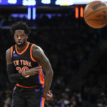 
              New York Knicks' Julius Randle (30) passes to a teammate during the first half of an NBA basketball game against the Los Angeles Lakers Tuesday, Jan. 31, 2023, in New York. (AP Photo/Frank Franklin II)
            