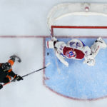 
              Montreal Canadiens' Jake Allen (34) blocks a shot by Philadelphia Flyers' Morgan Frost (48) during the second period of an NHL hockey game, Friday, Feb. 24, 2023, in Philadelphia. (AP Photo/Matt Slocum)
            