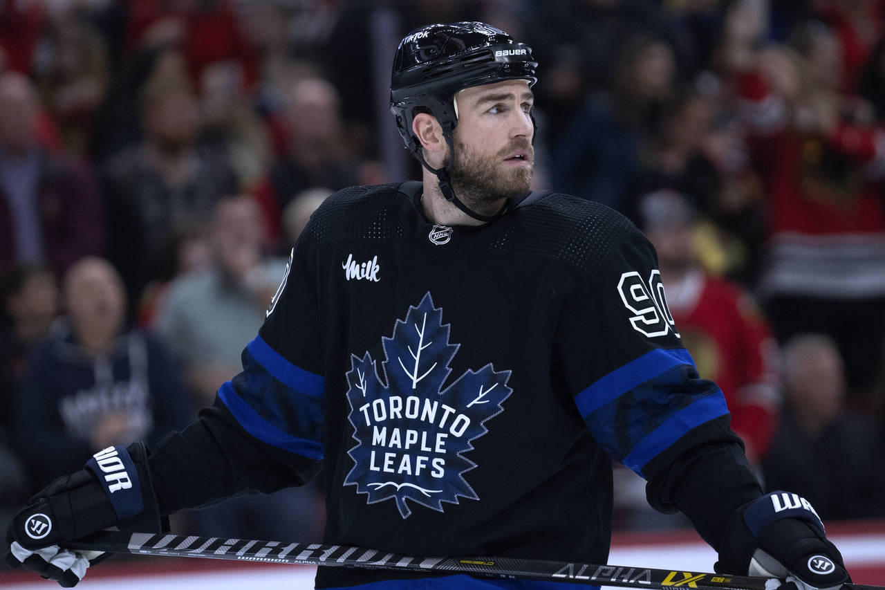 Toronto Maple Leafs center Ryan O'Reilly looks back after Chicago Blackhawks right wing Patrick Kan...