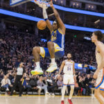 
              Golden State Warriors center Kevon Looney (5) dunks against the Oklahoma City Thunder during the first half of an NBA basketball game in San Francisco, Monday, Feb. 6, 2023. (AP Photo/John Hefti)
            