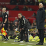
              CORRECT ID TO MICHAEL SKUBALA , NOT SIMON HOOPER  - Leeds United's interim head coach Michael Skubala, center, shouts out to his players during the English Premier League soccer match between Manchester United and Leeds United at Old Trafford in Manchester, England, Wednesday, Feb. 8, 2023. (AP Photo/Dave Thompson)
            