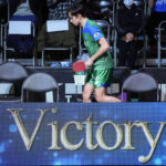 
              Brazil's Hugo Calderano walks after a WTT tournament table tennis match, Sunday, Feb. 12, 2023, in Kawasaki, near Tokyo. Calderano is No. 5 in the sport’s ranking, he reached No. 3 a year ago, and he's defeated many of the top Chinese including No. 1 Fan Zhendong. (AP Photo/Eugene Hoshiko)
            