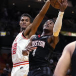 
              Houston Rockets guard Jalen Green (4) goes to the basket as Miami Heat center Orlando Robinson (25) defends during the first half of an NBA basketball game Friday, Feb. 10, 2023, in Miami. (AP Photo/Lynne Sladky)
            