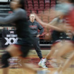 
              UNLV women's NCAA college basketball head coach Lindy La Rocque watches during practice Wednesday, Feb. 15, 2023, in Las Vegas. La Rocque might be the exception, the coach who stays and tries to build a program at a mid-major even if Power Five athletic directors try to lure her away with offers of more money and greater access to the NCAA tournament.(AP Photo/John Locher)
            