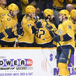 
              Nashville Predators left wing Cole Smith (36) is congratulated after scoring a goal against the Vancouver Canucks during the first period of an NHL hockey game Tuesday, Feb. 21, 2023, in Nashville, Tenn. (AP Photo/Mark Zaleski)
            