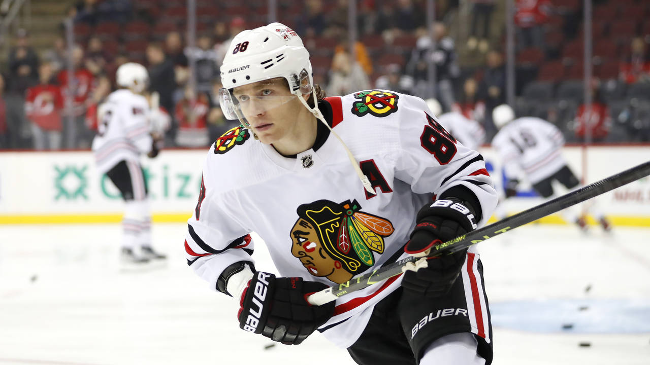 FILE - Chicago Blackhawks right wing Patrick Kane (88) skates during before an NHL hockey game agai...