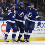 
              Tampa Bay Lightning center Ross Colton (79) celebrates his goal against the San Jose Sharks with left wing Pat Maroon (14) and left wing Nick Paul (20) during the first period of an NHL hockey game Tuesday, Feb. 7, 2023, in Tampa, Fla. (AP Photo/Chris O'Meara)
            