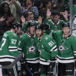 
              Dallas Stars' Mason Marchment (27), Fredrik Olofsson (42), Tyler Seguin (91) qnd Colin Miller (6) celebrate after Seguin scored in the first period of an NHL hockey game against the Chicago Blackhawks, Wednesday, Feb. 22, 2023, in Dallas. (AP Photo/Tony Gutierrez)
            