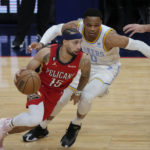 
              New Orleans Pelicans guard Jose Alvarado (15) drives to the basket against Los Angeles Lakers guard Russell Westbrook (0) in the first half of an NBA basketball game in New Orleans, Saturday, Feb. 4, 2023. (AP Photo/Gerald Herbert)
            