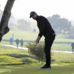 
              Aaron Rodgers follows his putt on the 16th green of the Pebble Beach Golf Links during the third round of the AT&T Pebble Beach Pro-Am golf tournament in Pebble Beach, Calif., Sunday, Feb. 5, 2023. (AP Photo/Godofredo A. Vásquez)
            