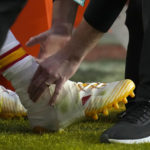 
              Kansas City Chiefs quarterback Patrick Mahomes's ankle is looked over by staff during the first half of the NFL Super Bowl 57 football game against the Philadelphia Eagles, Sunday, Feb. 12, 2023, in Glendale, Ariz. (AP Photo/Ashley Landis)
            