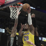 
              Los Angeles Lakers Rui Hachimura (28) goes up for a basket in the first half of an NBA basketball game against the Memphis Grizzlies, Tuesday, Feb. 28, 2023, in Memphis, Tenn. (AP Photo/Karen Pulfer Focht)
            
