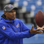 
              FILE - Buffalo Bills defensive assistant Leslie Frazier catches a ball before an NFL football game against the Houston Texans, Sunday, Oct. 3, 2021, in Orchard Park, N.Y. Bills defensive coordinator Leslie Frazier is taking a year off from coaching with plans to return for the 2024 season, the team announced on Tuesday, Feb. 28, 2023.  (AP Photo/Adrian Kraus, File)
            