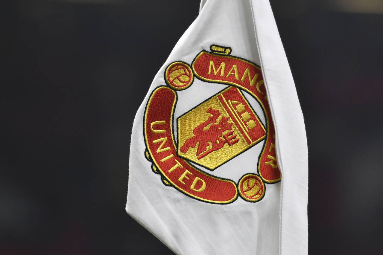 A corner flag showing the logo of Manchester United is seen ahead of the English FA Cup 4th round s...