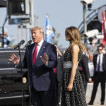 
              FILE - President Donald Trump, left, accompanied by first lady Melania Trump, gives the instructions "Gentlemen, start your engines" before the NASCAR Daytona 500 auto race at Daytona International Speedway, Feb. 16, 2020, in Daytona Beach, Fla. NASCAR marks its 75th year in 2023, recalling both its highs and lows. (AP Photo/Alex Brandon, File)
            
