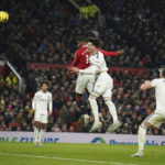 
              Manchester United's Marcus Rashford, top left, heads the ball to score his sides first goal during the English Premier League soccer match between Manchester United and Leeds United at Old Trafford in Manchester, England, Wednesday, Feb. 8, 2023. (AP Photo/Dave Thompson)
            