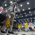 
              Saint Mary's guard Logan Johnson (0) inbounds the ball to teammate Alex Ducas (44) during the first half of an NCAA college basketball game against San Francisco, Thursday, Feb. 2, 2023, in Moraga, Calif. (AP Photo/D. Ross Cameron)
            