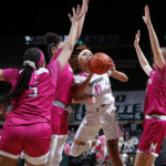 
              Michigan State's DeeDee Hagemann (0) and Maryland's Brinae Alexander, left, Abby Meyers, right, and Lavender Briggs vie for the ball during the second half of an NCAA college basketball game, Saturday, Feb. 18, 2023, in East Lansing, Mich. (AP Photo/Al Goldis)
            