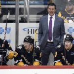 
              Pittsburgh Penguins head coach Mike Sullivan becomes vocal from the bench as they play the Edmonton Oilers during the first period of an NHL hockey game, Thursday, Feb. 23, 2023, in Pittsburgh. (AP Photo/Philip G. Pavely)
            
