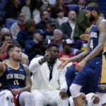 
              New Orleans Pelicans forward Brandon Ingram (14) slaps hands with forward Zion Williamson, center, and center Willy Hernangomez during the first half of the team's NBA basketball game against the Minnesota Timberwolves in New Orleans, Wednesday, Jan. 25, 2023. (AP Photo/Matthew Hinton)
            