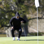 
              Tiger Woods lines up his putt on the 16th green during the pro-am of the Genesis Invitational golf tournament at Riviera Country Club, Wednesday, Feb. 15, 2023, in the Pacific Palisades area of Los Angeles. (AP Photo/Ryan Kang)
            