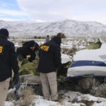 
              This photo provided by The National Transportation Safety Board shows NTSB investigators on Sunday, Feb. 26, 2023, at the crash site in Dayton, Nev., documenting the wreckage of a Pilatus PC-12 airplane a medical air transport flight operated by Guardian Flight that crashed on Friday, Feb. 24, while enroute from Reno, Nevada, to Salt Lake City. (NTSB via AP)
            