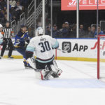
              St. Louis Blues' Robert Thomas (18) scores a goal against Seattle Kraken's Martin Jones (30) during the second period of an NHL hockey game on Tuesday, Feb. 28, 2023, in St. Louis. (AP Photo/Michael Thomas)
            