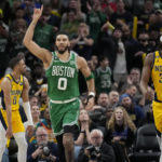 
              Boston Celtics forward Jayson Tatum (0) gestures after scoring in overtime of the team's NBA basketball game against the Indiana Pacers in Indianapolis, Thursday, Feb. 23, 2023. The Celtics won 142-138. (AP Photo/AJ Mast)
            