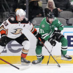 
              Anaheim Ducks' Jakob Silfverberg (33) and Dallas Stars' Tyler Seguin (91) compete for control of the puck in the second period of an NHL hockey game, Monday, Feb. 6, 2023, in Dallas. (AP Photo/Tony Gutierrez)
            