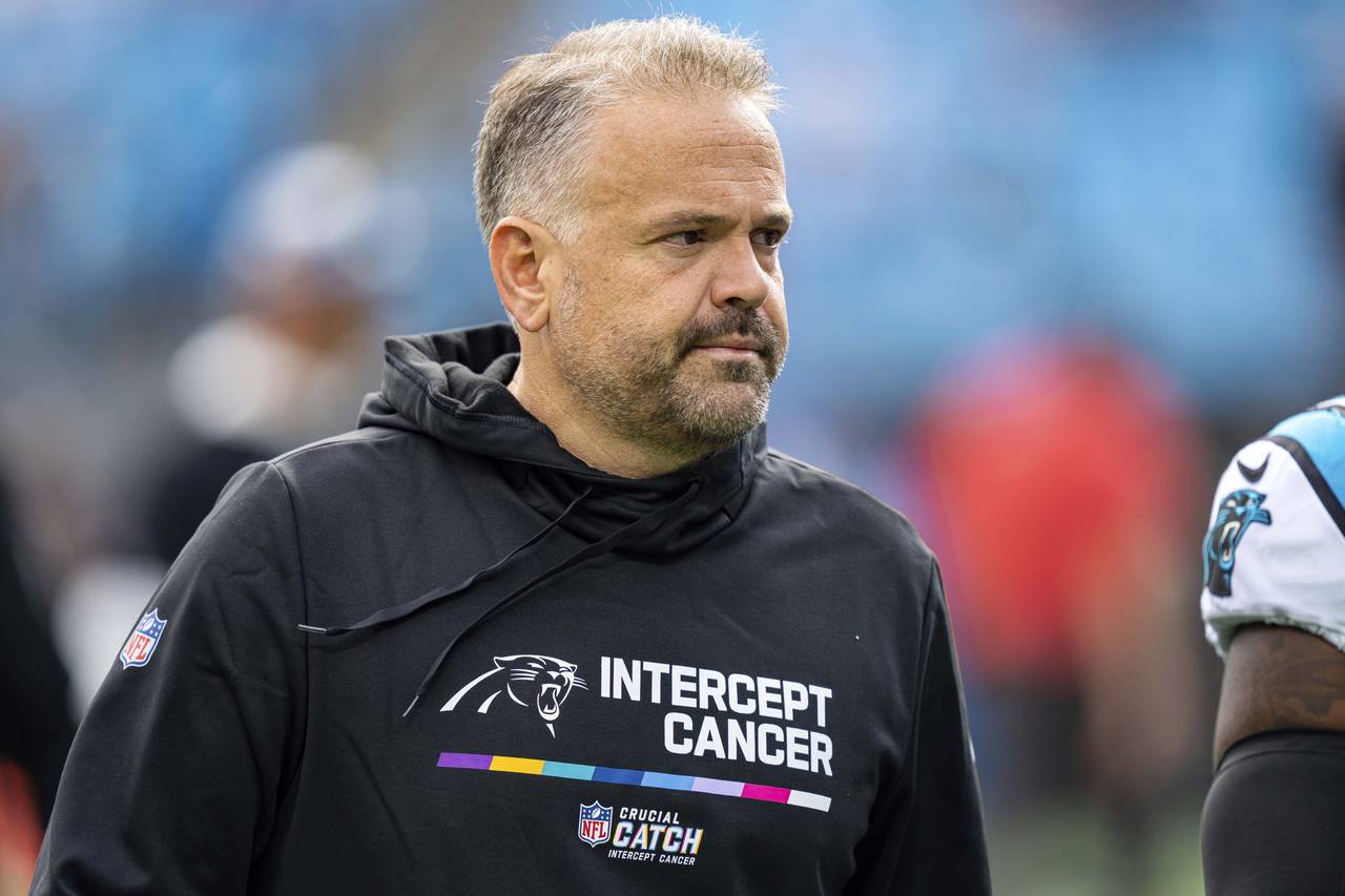 FILE - Carolina Panthers head coach Matt Rhule looks on before an NFL football game against the San...