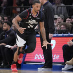 
              Los Angeles Clippers forward Norman Powell gestures after scoring a three-point basket in the first half of an NBA basketball game against the New York Knicks, Saturday, Feb. 4, 2023, at Madison Square Garden in New York. (AP Photo/Mary Altaffer)
            