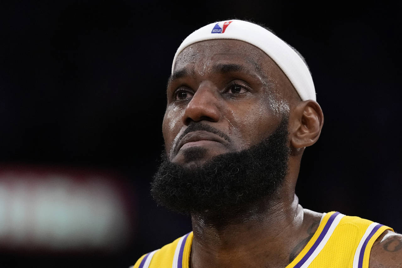Los Angeles Lakers forward LeBron James appears to tear up after passing Kareem Abdul-Jabbar to bec...