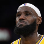 
              Los Angeles Lakers forward LeBron James appears to tear up after passing Kareem Abdul-Jabbar to become the NBA's all-time leading scorer during the second half of an NBA basketball game against the Oklahoma City Thunder Tuesday, Feb. 7, 2023, in Los Angeles. (AP Photo/Ashley Landis)
            