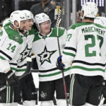 
              The Dallas Stars celebrate a goal by center Roope Hintz, center, against the Vegas Golden Knights during the third period of an NHL hockey game Saturday, Feb. 25, 2023, in Las Vegas. (AP Photo/David Becker)
            