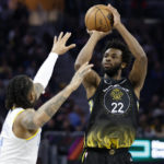 
              Golden State Warriors forward Andrew Wiggins (22) shoots against Los Angeles Lakers guard D'Angelo Russell (1) during the first half of an NBA basketball game in San Francisco, Saturday, Feb. 11, 2023. (AP Photo/Jed Jacobsohn)
            