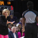 
              LSU's head coach Kim Mulkey argues with official, Demoya Pugh, in the first half of an NCAA college basketball game in College Station, Texas, Sunday, Feb. 5, 2023. (Logan Hannigan-Downs/College Station Eagle via AP)
            