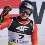 
              Switzerland's Marco Odermatt gets to the finish area after completing an alpine ski, men's World Championship super-G race, in Courchevel, France, Thursday, Feb. 9, 2023. (AP Photo/Marco Trovati)
            