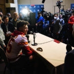 
              Kansas City Chiefs' Patrick Mahomes, center, answers a question during an NFL football Super Bowl media availability in Scottsdale, Ariz., Tuesday, Feb. 7, 2023. The Chiefs will play against the Philadelphia Eagles in Super Bowl LVII on Sunday. (AP Photo/Ross D. Franklin)
            