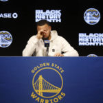 
              Golden State Warriors' Stephen Curry speaks at a news conference before an NBA basketball game against the Washington Wizards in San Francisco, Monday, Feb. 13, 2023. (AP Photo/Jed Jacobsohn)
            