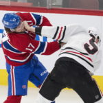 
              Montreal Canadiens' Josh Anderson (17) trades punches with Chicago Blackhawks' Connor Murphy (5) during the first period an NHL hockey game Tuesday, Feb. 14, 2023 in Montreal. (Ryan Remiorz/The Canadian Press via AP)
            