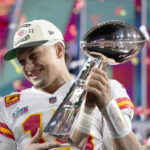 
              Kansas City Chiefs quarterback Patrick Mahomes (15) holds the trophy after their win against the Philadelphia Eagles in the NFL Super Bowl 57 football game, Sunday, Feb. 12, 2023, in Glendale, Ariz. The Kansas City Chiefs defeated the Philadelphia Eagles 38-35. (AP Photo/Matt Slocum)
            