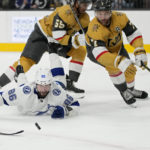 
              Tampa Bay Lightning right wing Nikita Kucherov (86) attempts to knock the puck up the ice against Vegas Golden Knights defenseman Alex Pietrangelo (7) during the first period of an NHL hockey game Saturday, Feb. 18, 2023, in Las Vegas. (AP Photo/John Locher)
            