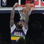 
              New Orleans Pelicans forward Brandon Ingram dunks in the first half of an NBA basketball game against the Oklahoma City Thunder, Monday, Feb. 13, 2023, in Oklahoma City. (AP Photo/Sue Ogrocki)
            