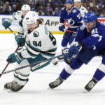 
              San Jose Sharks left wing Alexander Barabanov (94) works around a stick check by Tampa Bay Lightning defenseman Erik Cernak (81) during the first period of an NHL hockey game Tuesday, Feb. 7, 2023, in Tampa, Fla. (AP Photo/Chris O'Meara)
            