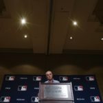 
              Major League Baseball Commissioner Robert Dean Manfred Jr. answers questions at spring training media day Wednesday, Feb. 15, 2023, in Phoenix. (AP Photo/Morry Gash)
            