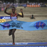 
              Beatrice Chebet of Kenya wins the senior women's race at the World Athletics Cross Country Championships in Bathurst, Australia, Saturday, Feb. 18, 2023. (Dean Lewins/AAP Image via AP)
            